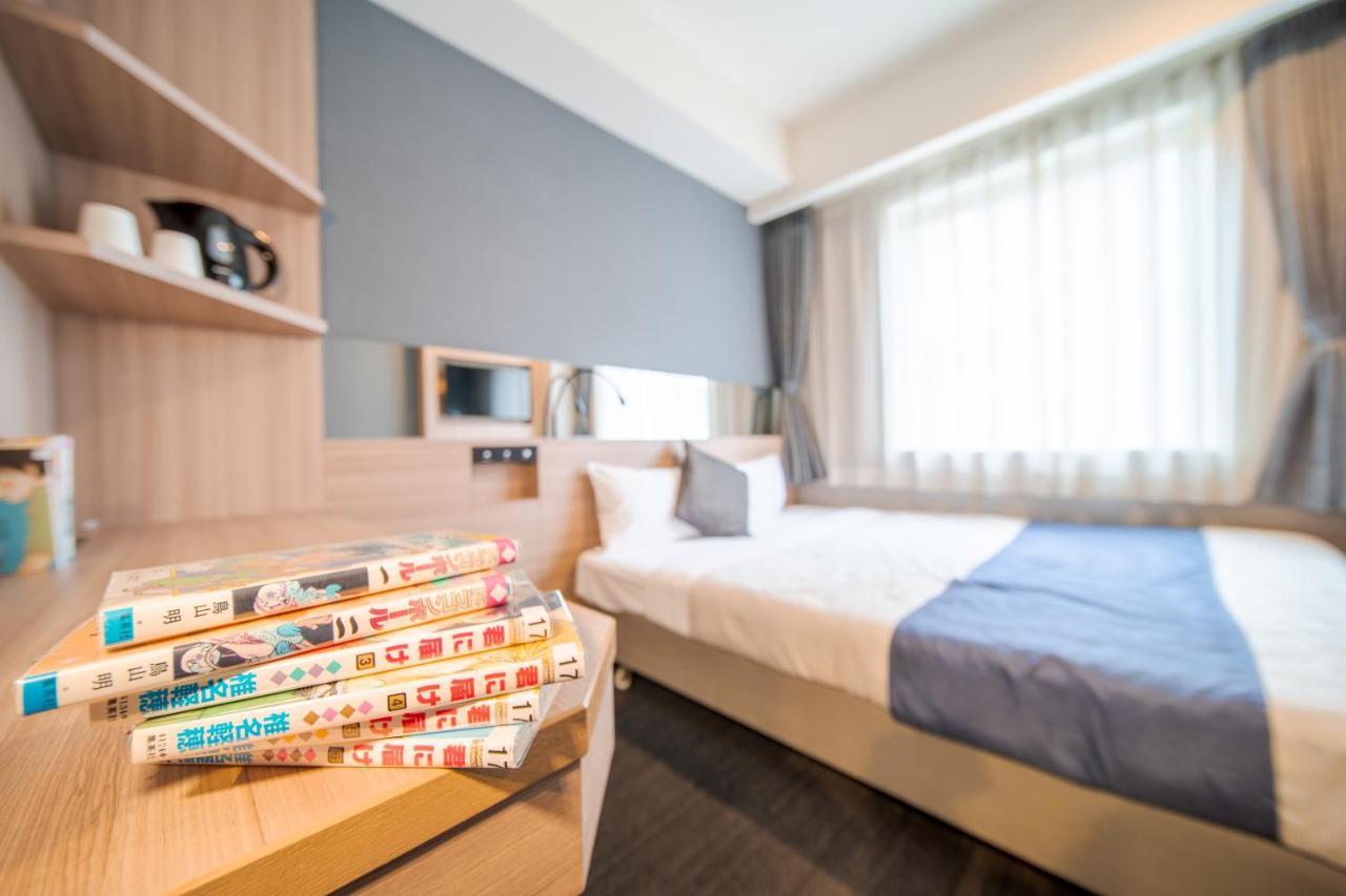 Quintessa Hotel Osaka Shinsaibashi Comic & Books Extérieur photo